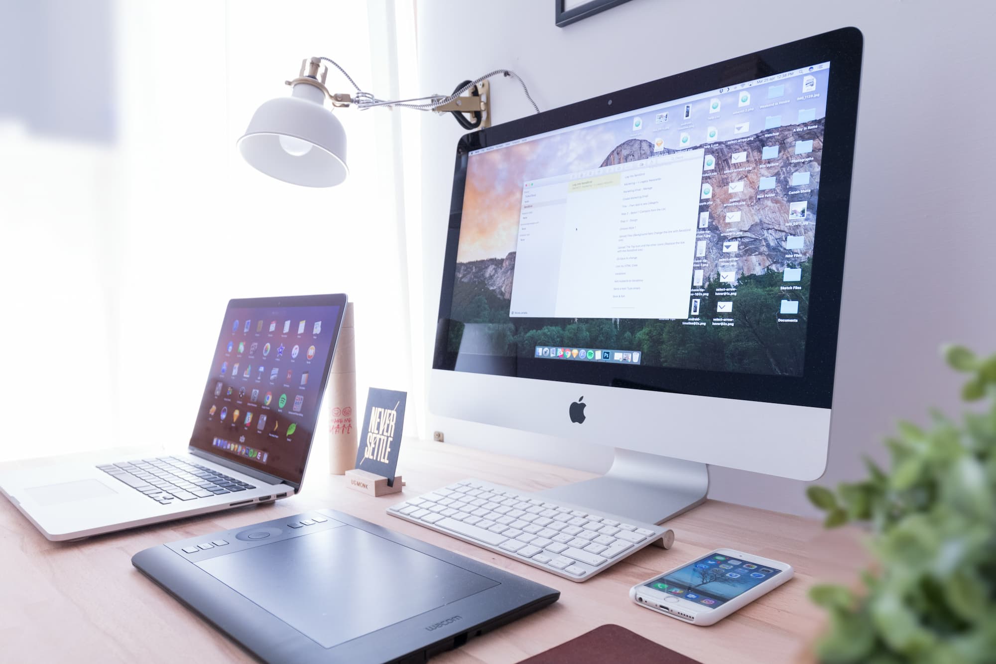 A well-lit desk with multiple devices on it, potentially suggesting multiple viewports.