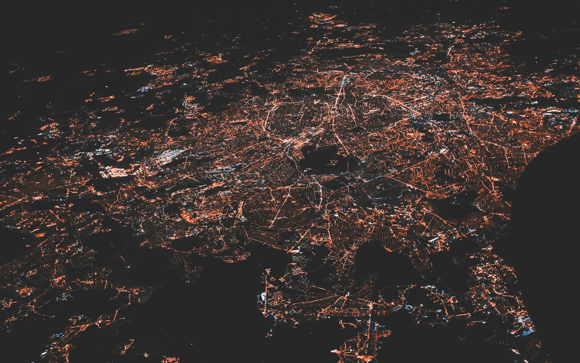 A bright network of urban lights at night.
